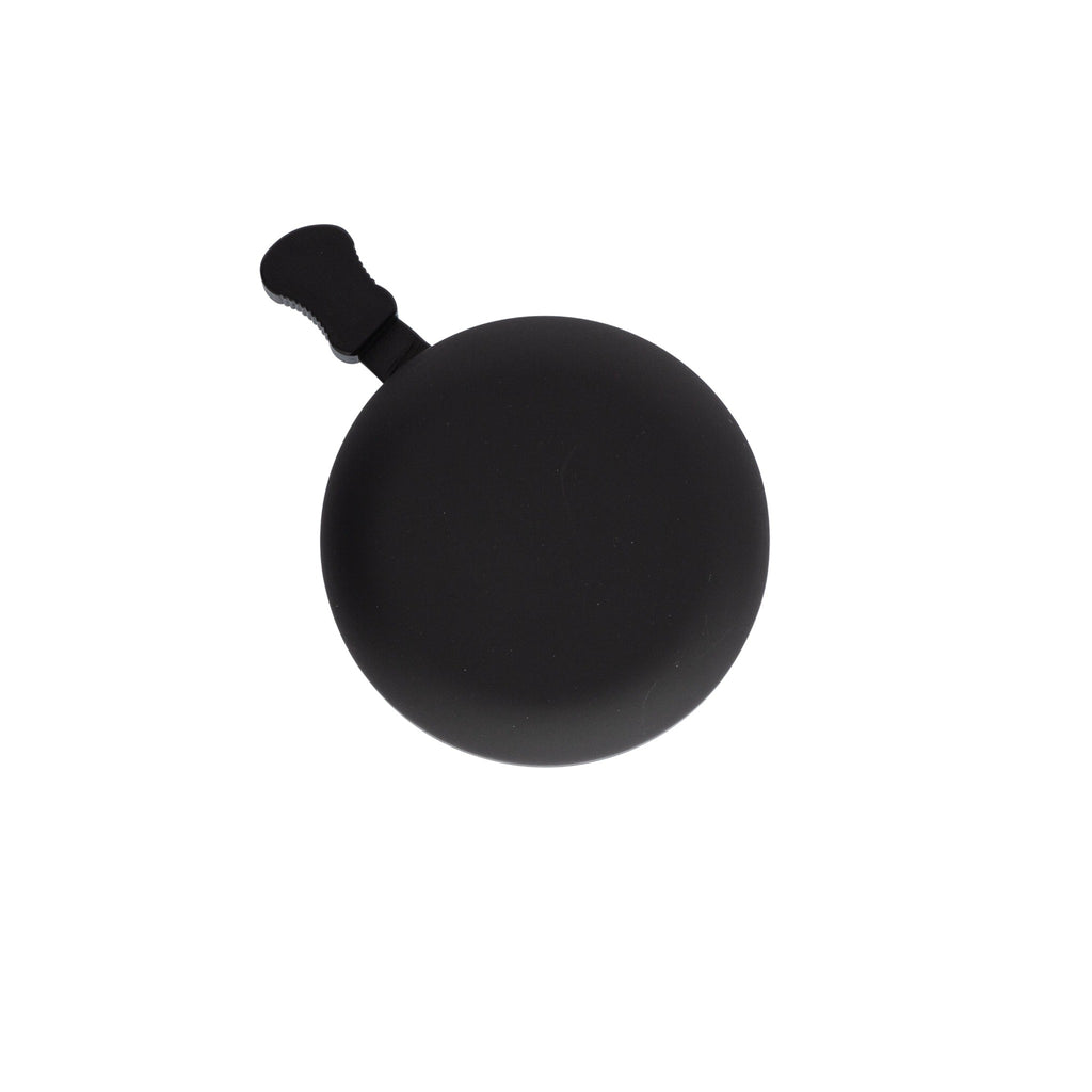 Classic bicycle bell color matte black, top view on white background. Vintage style bicycle bell.